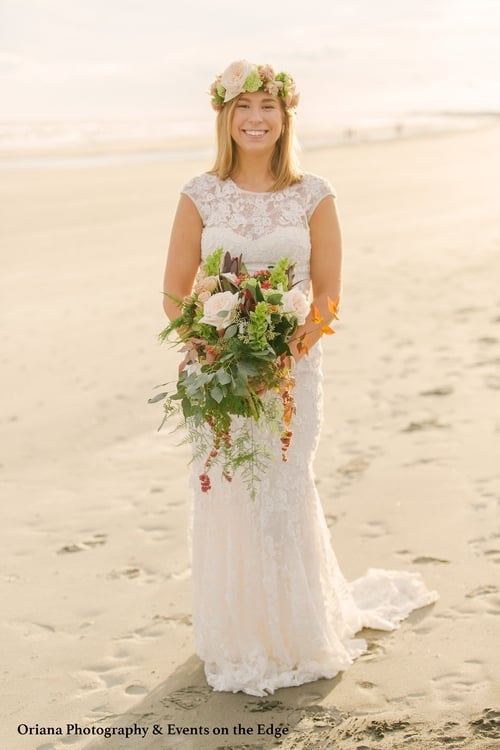 Bride in dress on Folly Beach