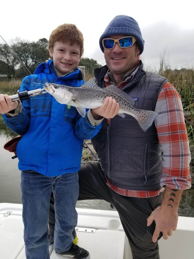 dad Kid Trout Child and Dad Fishing